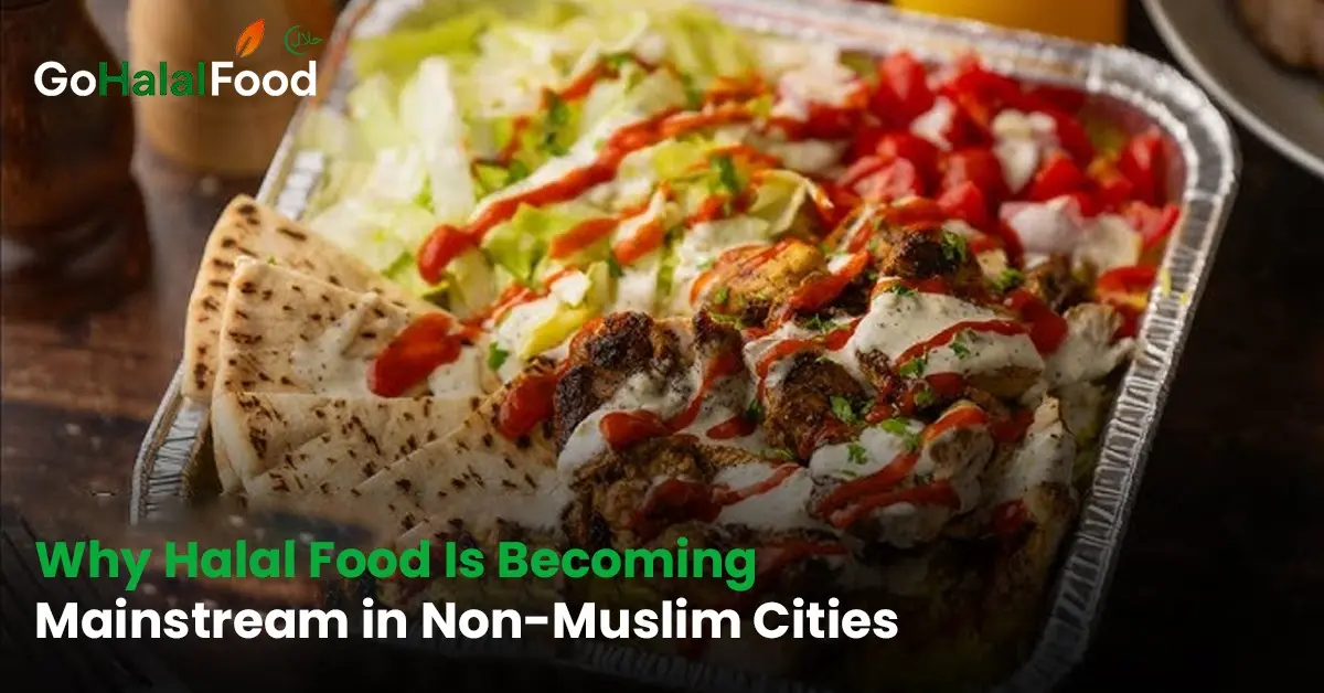Halal food platter with grilled meat, fresh salad, pita bread, and sauces showing why halal food is gaining popularity in non Muslim cities.